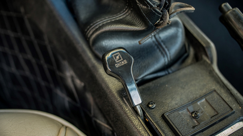 Choke lever on car center console