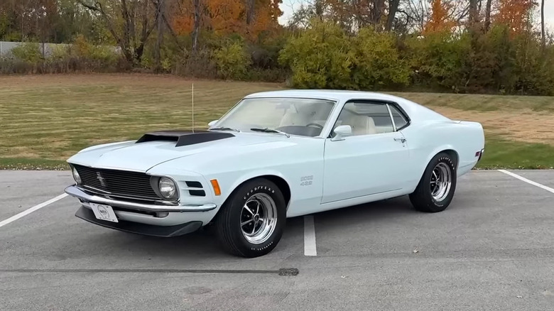 A blue 1970 Ford Mustang Boss 429 parked