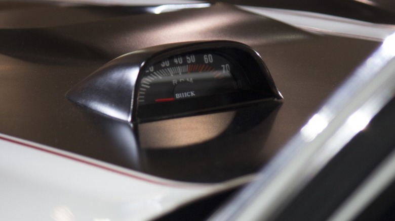 External tachometer mounted on Buick GSX hood