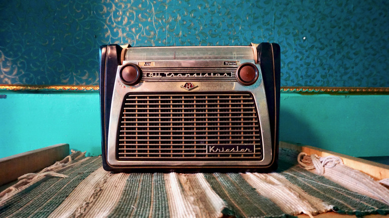 An old transistor radio resting on a table.