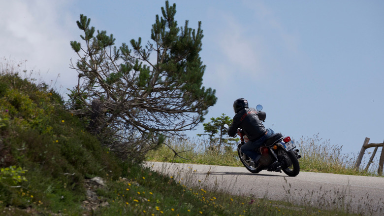 person riding motorcycle