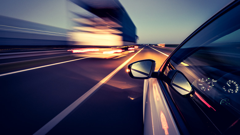 closeup of car with blurry surroundings