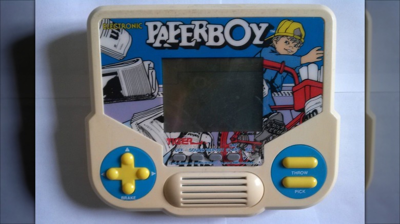 The Tiger Electronics Paperboy against a light blue background