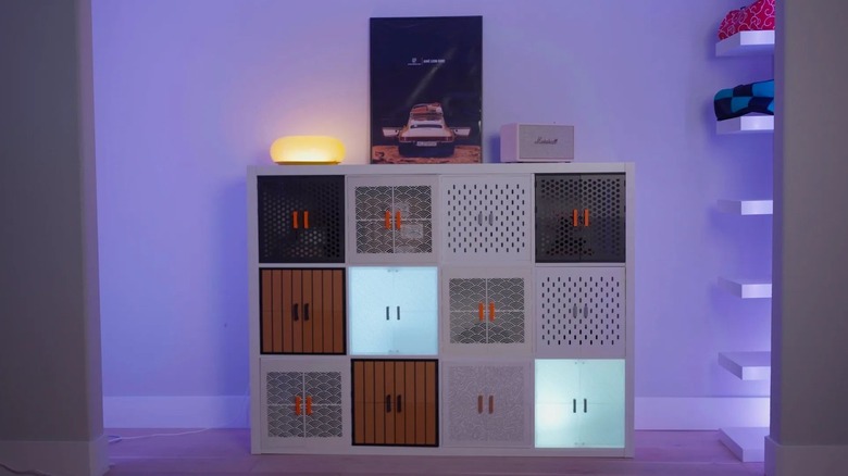 A picture of an Ikea Kallax with 3D printed cabinet doors.