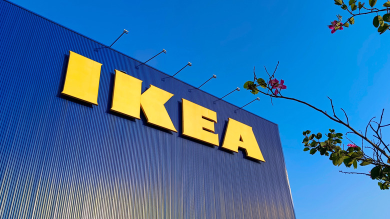 Ikea logo on building exterior.