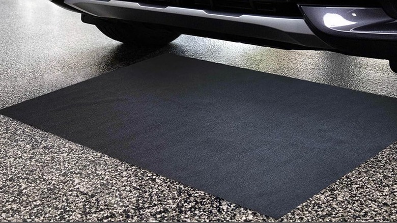 man working under vehicle