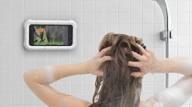 woman showering with phone