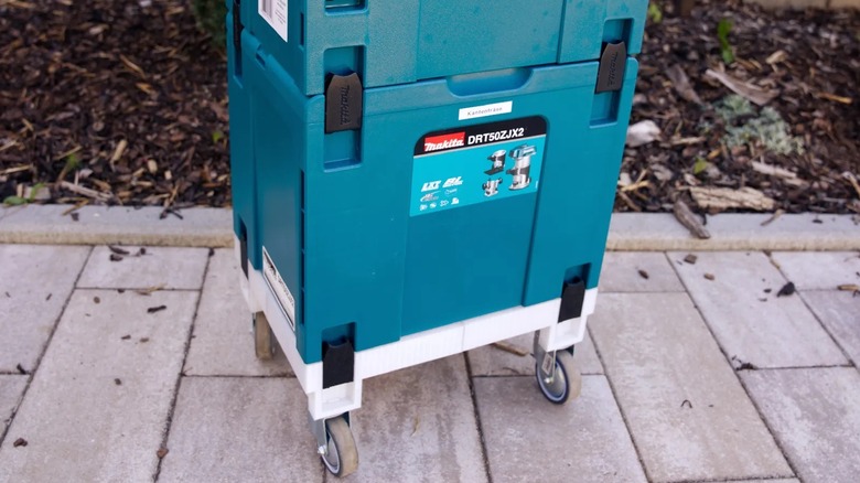 A 3D printed trolley base for a Makita MakPac showing wheels.