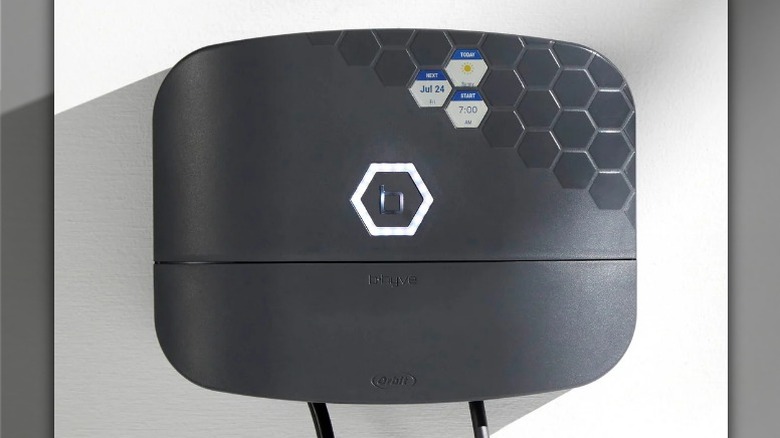 Orbit B-Hyve XR smart sprinkler controller mounted on white wall