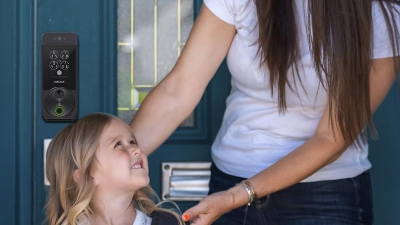 Mother and child in front of Lockly Visage Zeno Series Smart Lock