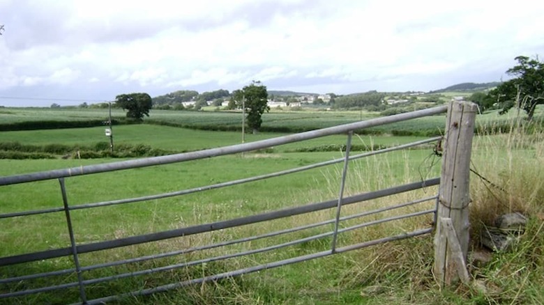 A sagging gate near a gatehouse farm.