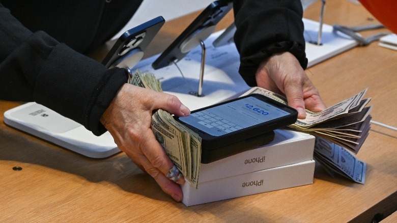 Exchanging cash for an iPhone