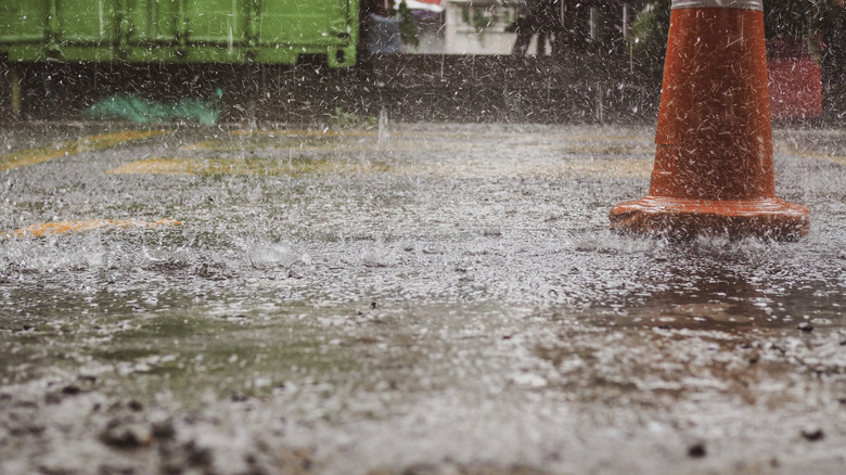Close-up of the ground during heavy rain on a construction site.