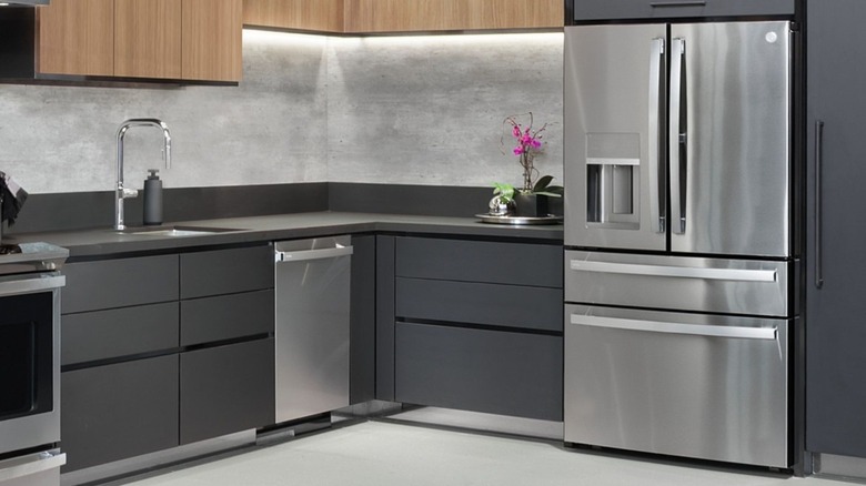 A GE French Door fridge along with other kitchen appliances