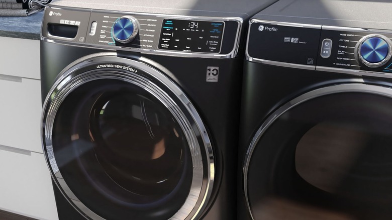 front loading GE washing machine in home