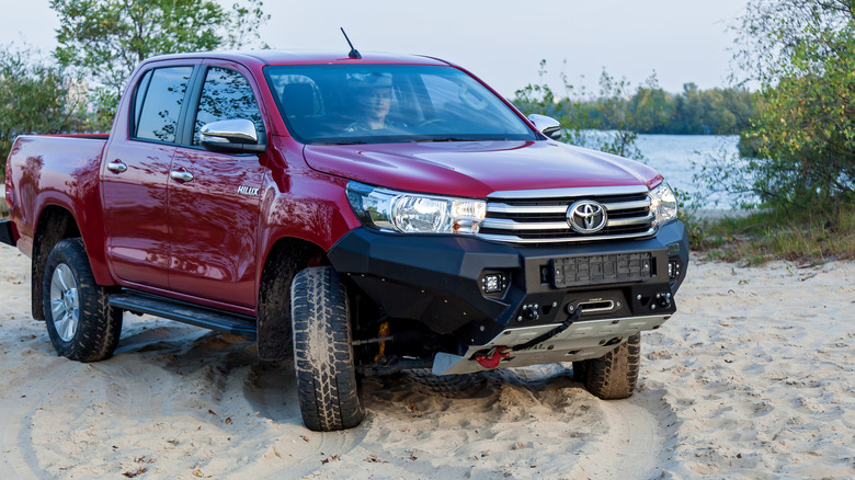 Pickup truck with bumper winch