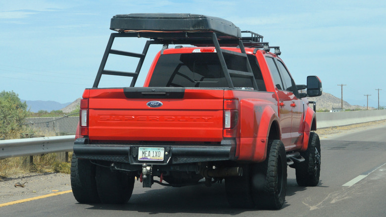 Pickup truck with roof rack and cargo