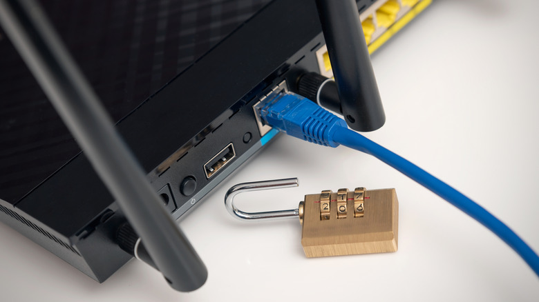 An unlocked padlock next to a Wi-Fi router