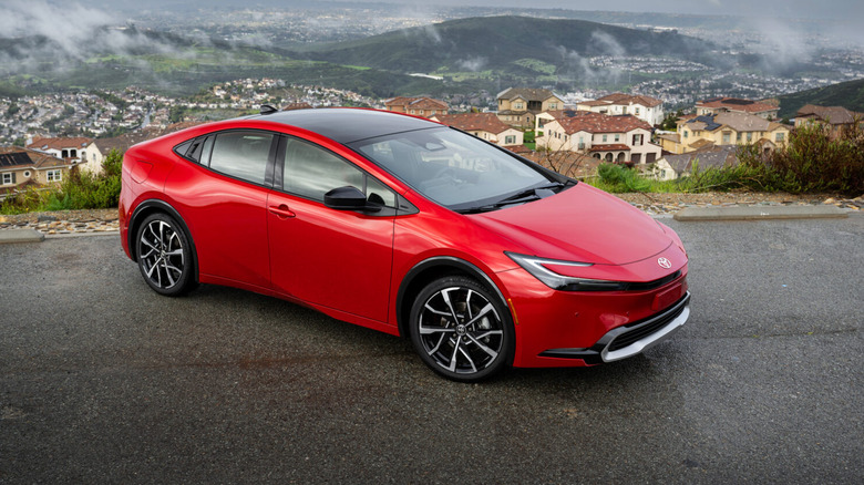A red-colored 2026 Toyota Prius hybrid