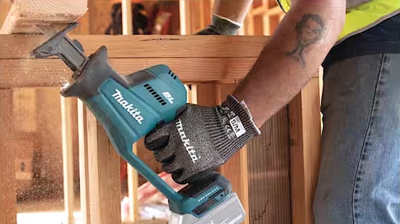 Person using Makita Compact Recipro Saw