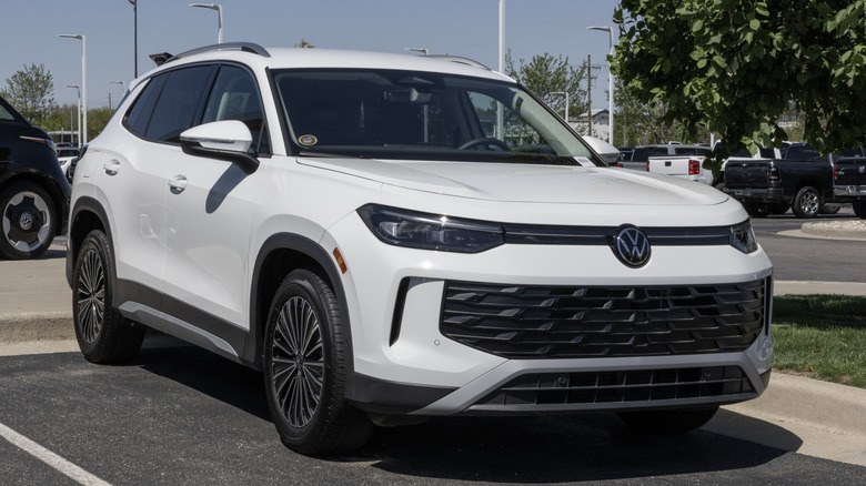 A white 2026 Volkswagen Tiguan SUV parked in a dealership lot.