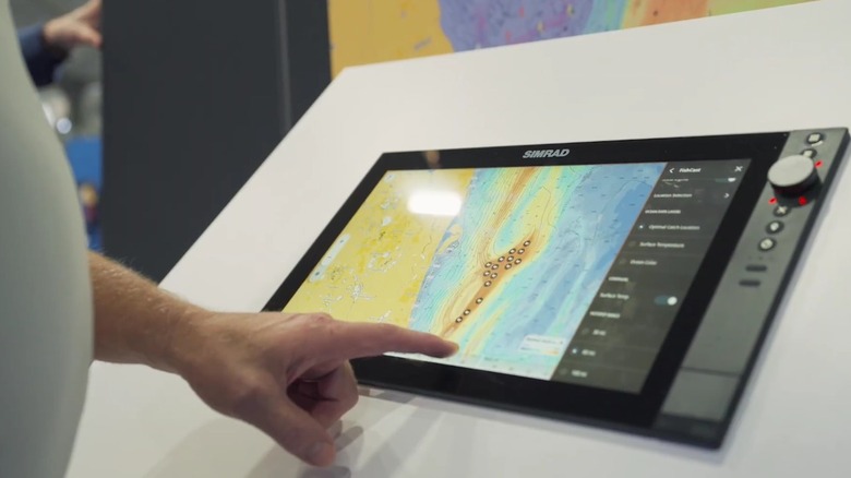 A person using Simrad's FishCast system.