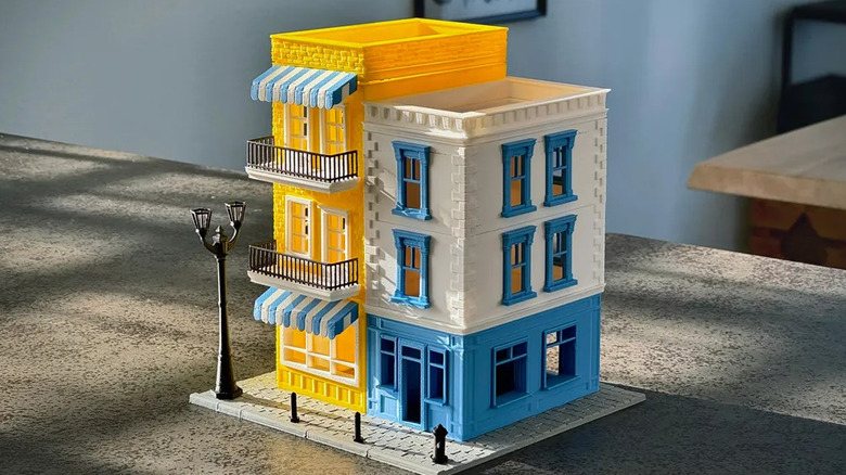 A desk organizer shaped like city buildings.