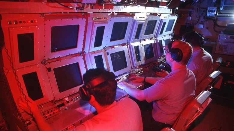 Sonar operators aboard a U.S. submarine
