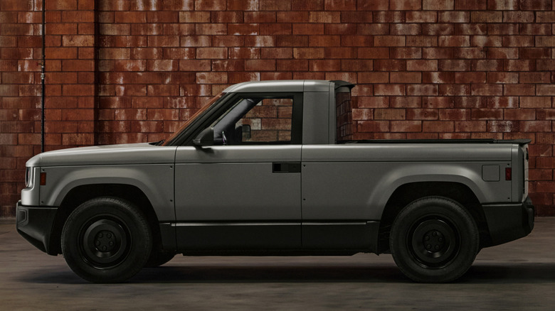A side profile look at the Slate truck in front of a brick wall
