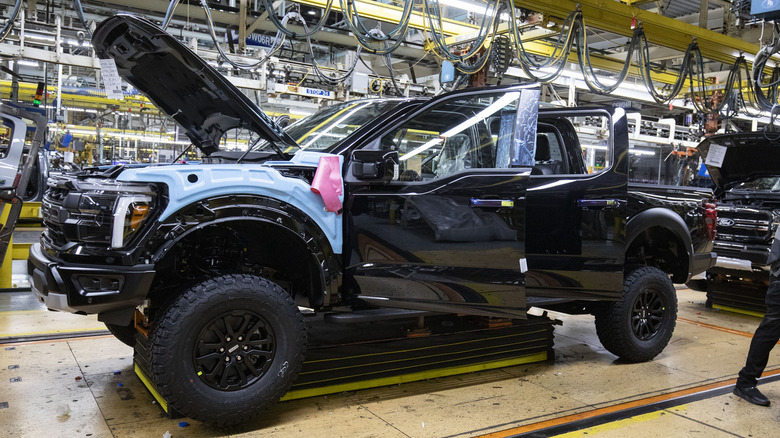 A black Ford F-150 going through production assemblies at the Ford Dearborn Plant