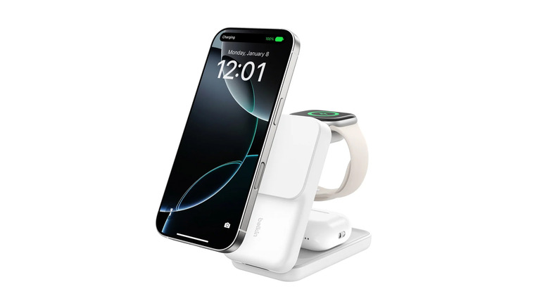 A Belkin 3-in-1 Charging Stand on a white background, charging multiple accessories.