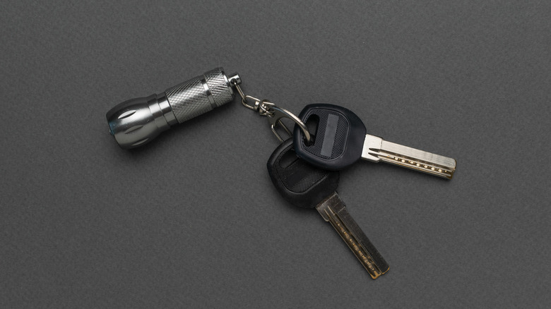 A flashlight attached to a keychain