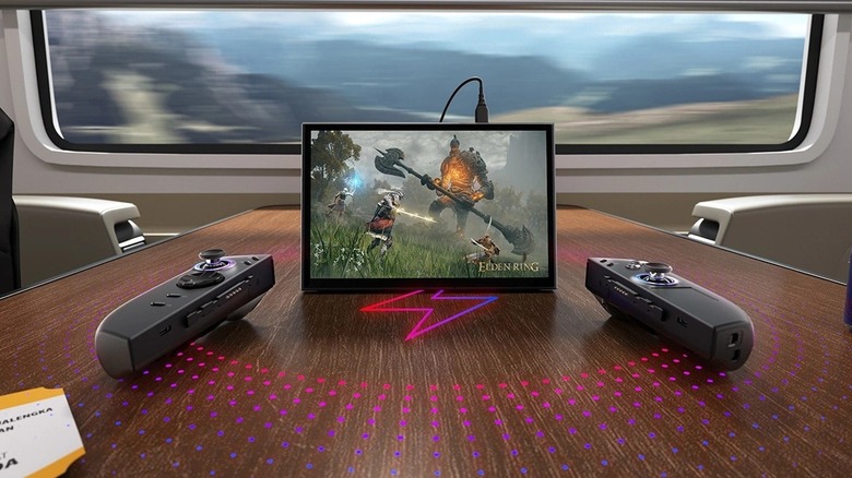 Lenovo Legion Go 2 with "Elden Ring" on the screen resting on a train table.