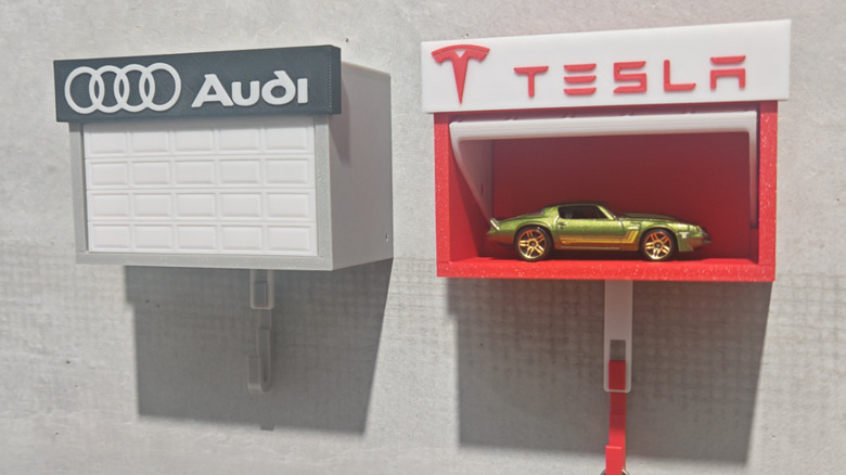 Custom key holder with car branding and a mock garage