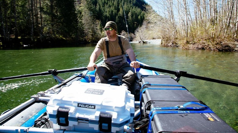 pelican cooler in a boat on the water