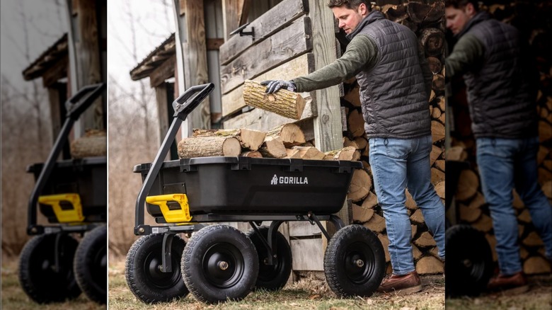 man putting firewood on cart