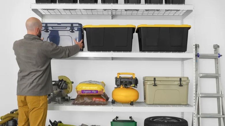 Person placing crates on SafeRacks shelving unit