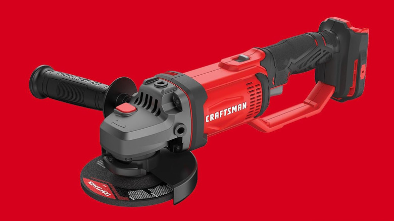 Craftsman V20 small angle grinder displayed on a plain red background.