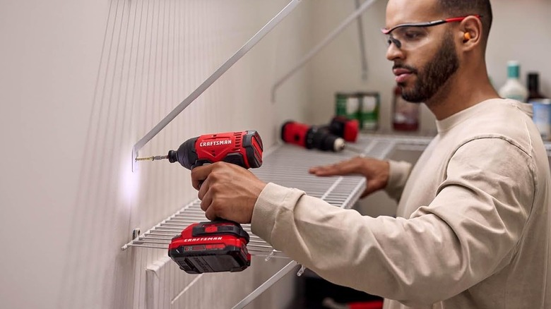 Man using a Craftsman V20 1/4 inch impact driver