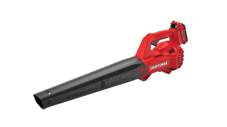 Red and black cordless leaf blower with a white background