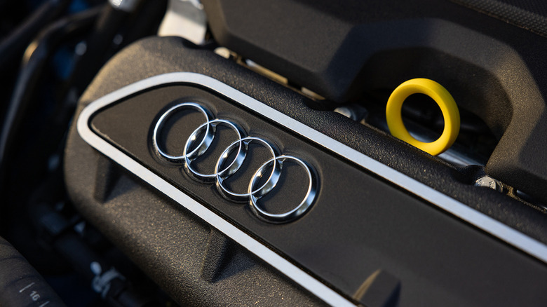 Close-up view of Audi logo on Audi RS 3 engine.