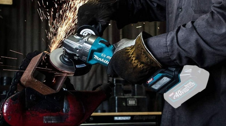 Person grinding steel with 40V Max XGT Brushless Corrdless 4 ½-inch to 5-inch Angle Grinder