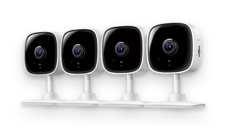 Four TP link indoor security cameras on a white background