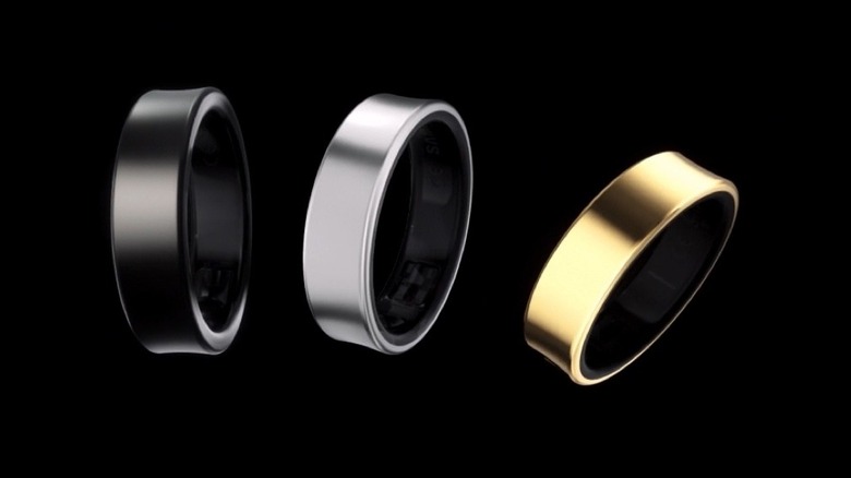 Three Samsung Galaxy rings over a black background