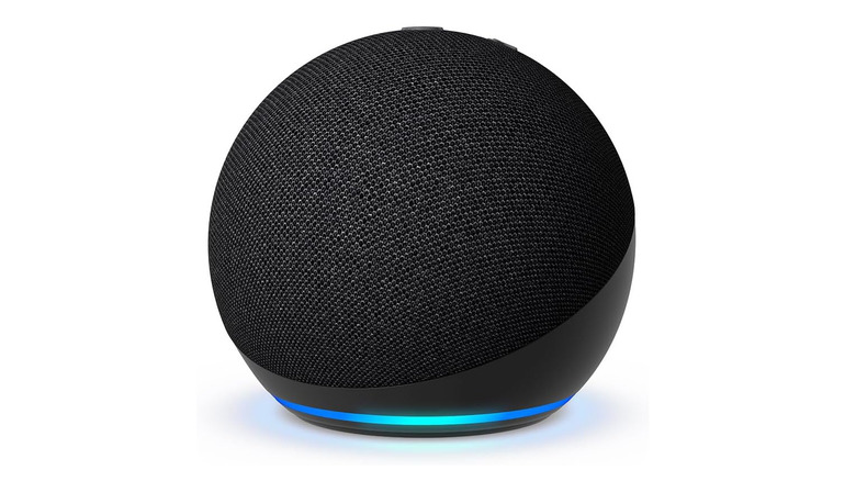 The Amazon dot speaker on a white background