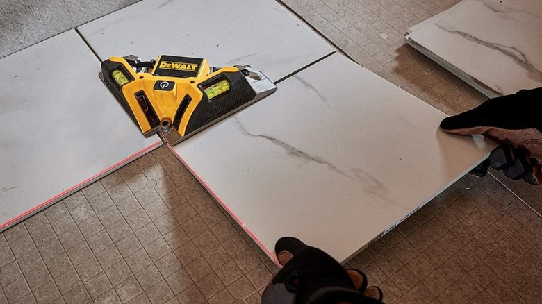 using laser square to install tile