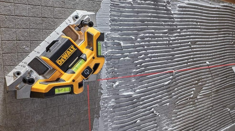 laser square on tile wall