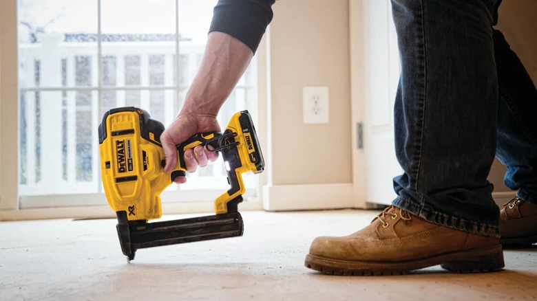 DeWalt 20V Max 18-Gauge Narrow Crown Stapler in use