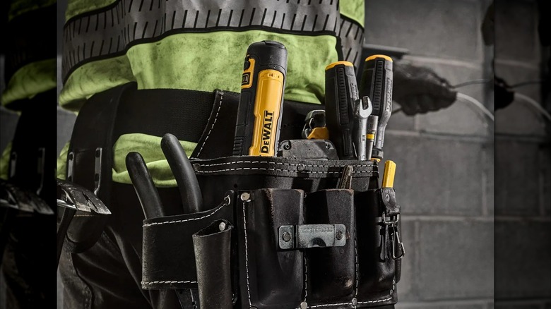 4V USB Rechargeable Electric Screwdriver and other DeWalt tools in a tool belt