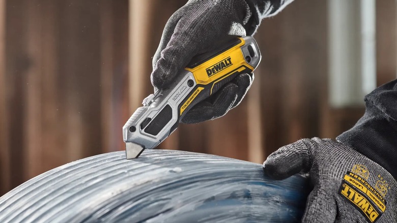 DeWalt ToughSeries Retractable Utility Knife in use